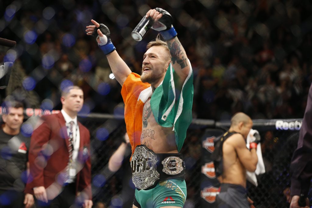 Conor McGregor reacts after defeating Jose Aldo during a featherweight championship mixed martial arts bout at UFC 194, Saturday, Dec. 12, 2015, in Las Vegas. (AP Photo/John Locher) Conor McGregor reacts after defeating Jose Aldo during a featherweight championship mixed martial arts bout at UFC 194, Saturday, Dec. 12, 2015, in Las Vegas. (AP Photo/John Locher)