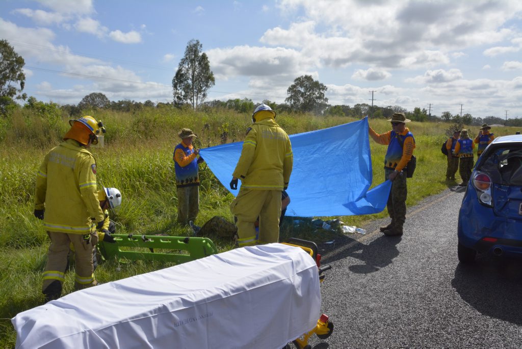 Emergency services at the scene of a five-vehicle crash in which March of the Dungarees 2015 cadets were injured on Gatton-Helidon Rd at Helidon. Emergency services at the scene of a five-vehicle crash in which March of the Dungarees 2015 cadets were injured on Gatton-Helidon Rd at Helidon.