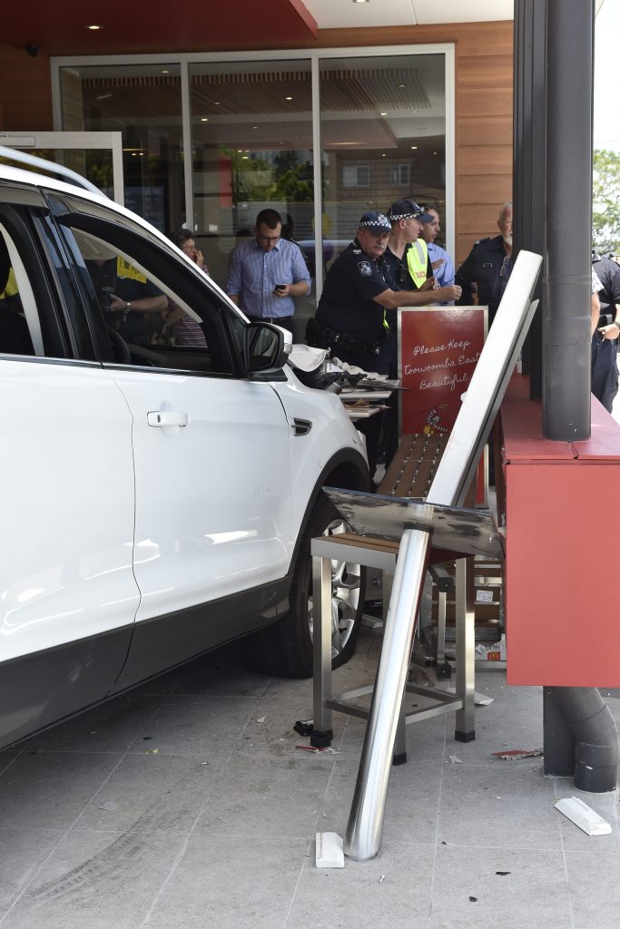 A car has crashed into a section of the new McDonald's Restaurant on Herries Street injuring two children. A car has crashed into a section of the new McDonald's Restaurant on Herries Street injuring two children.