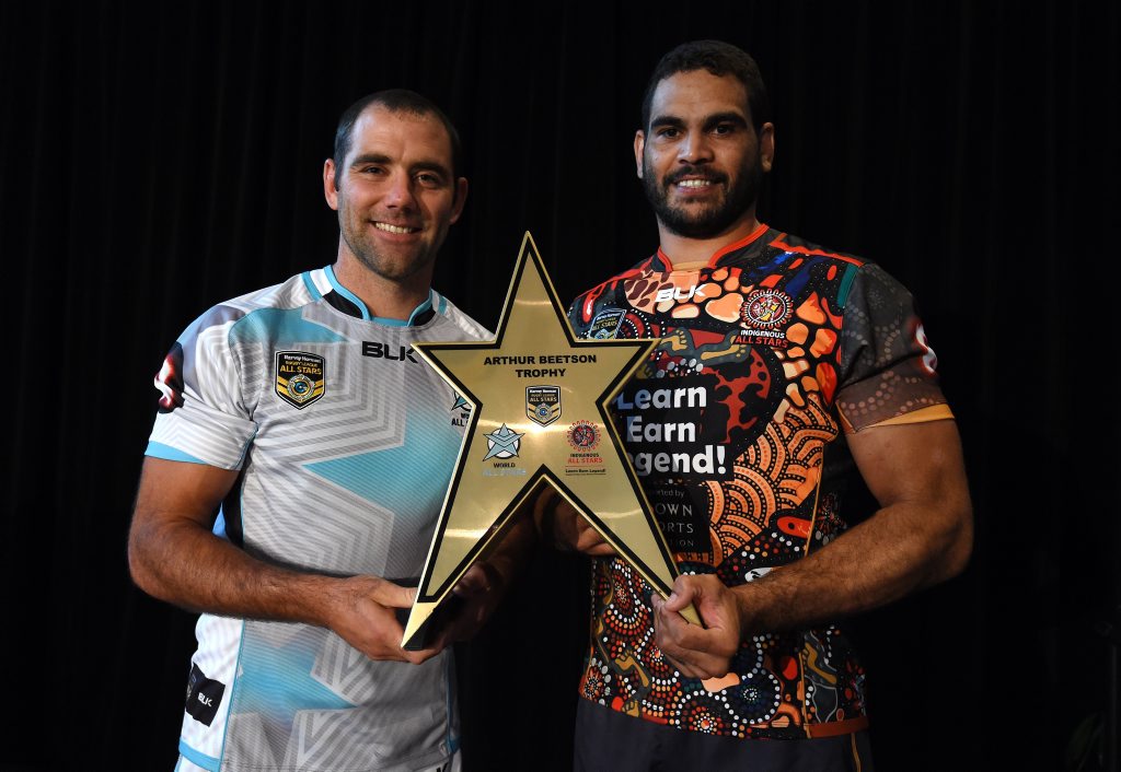 Captain of the World All Stars Cameron Smith (left) and Greg Inglis of the Indigenous All Stars pose for a photo with the Arthur Beetson trophy after both teams were announced in Brisbane. The All Stars game will be played at Suncorp Stadium on February 13, 2016. Photo: AAP Image/Dan Peled. Captain of the World All Stars Cameron Smith (left) and Greg Inglis of the Indigenous All Stars pose for a photo with the Arthur Beetson trophy after both teams were announced in Brisbane. The All Stars game will be played at Suncorp Stadium on February 13, 2016. Photo: AAP Image/Dan Peled.