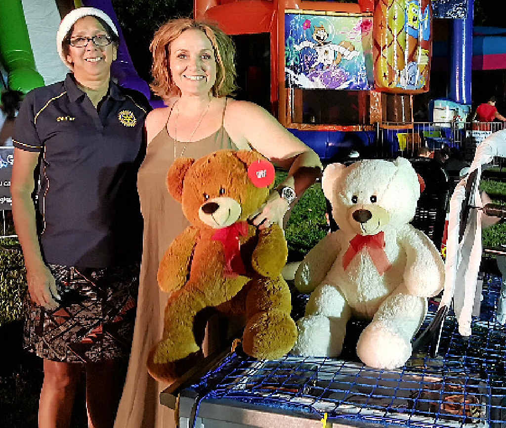 EXCITED: Rotary Club of Gladstone director Pauline Kelly and Christmas trailer raffle winner Raewyn Huddy celebrate. EXCITED: Rotary Club of Gladstone director Pauline Kelly and Christmas trailer raffle winner Raewyn Huddy celebrate.