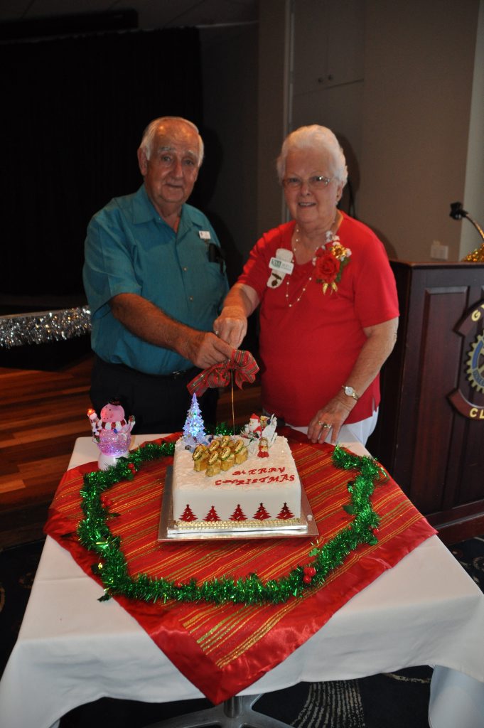 Col Wessling and Beryl Polkinghorne cut the Christmas Cake. Col Wessling and Beryl Polkinghorne cut the Christmas Cake.
