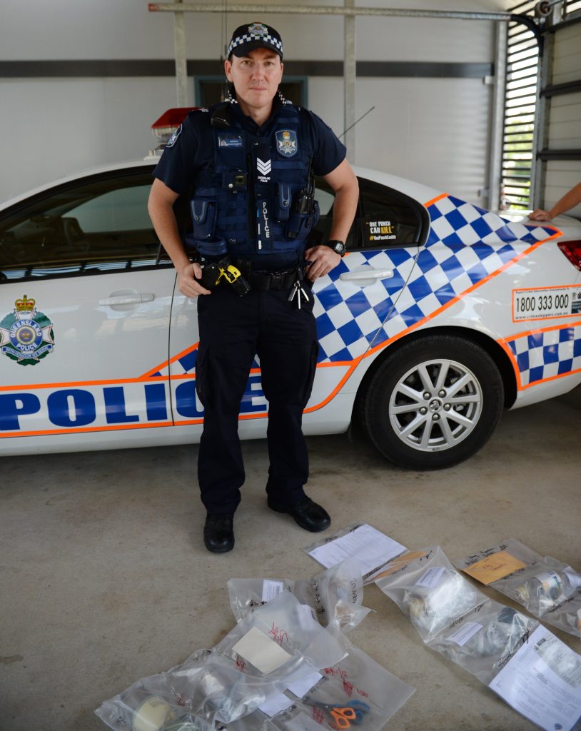Sergeant Anthony Houston at Gracemere police station with some of the items found in drug raids today.. Photo Allan Reinikka / The Morning Bulletin Sergeant Anthony Houston at Gracemere police station with some of the items found in drug raids today.. Photo Allan Reinikka / The Morning Bulletin