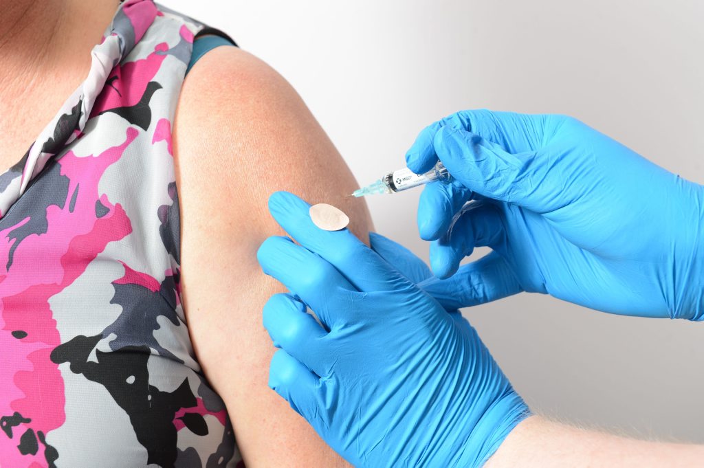 Nurse Adam Spinks with administering the measles vaccination at the Ipswich Health Plaza on Wednesday. Photo: Sarah Harvey / The Queensland Times Nurse Adam Spinks with administering the measles vaccination at the Ipswich Health Plaza on Wednesday. Photo: Sarah Harvey / The Queensland Times