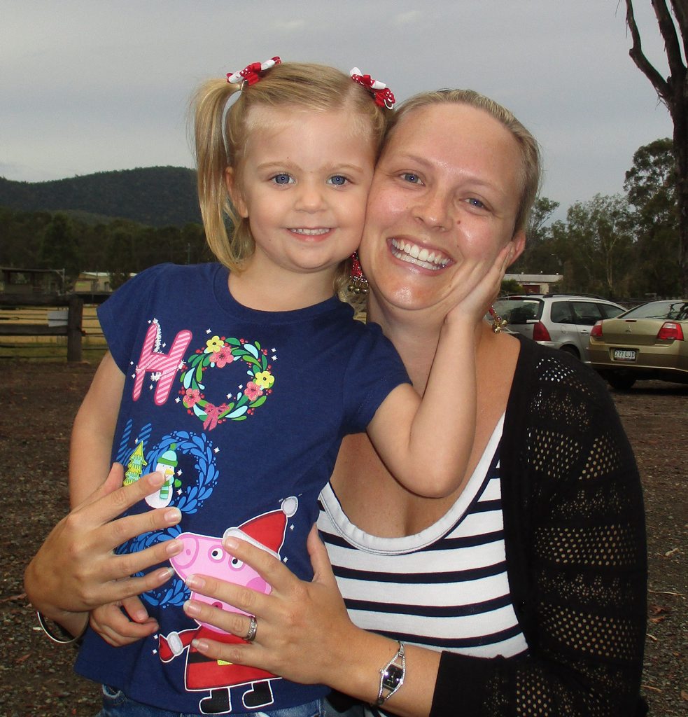 Naomi Neal and daughter Skyla, thrilled to watch Santa arriving at the Bushman's Bar on Saturday. Naomi Neal and daughter Skyla, thrilled to watch Santa arriving at the Bushman's Bar on Saturday.