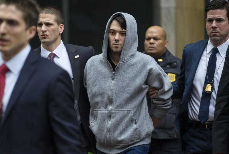 Martin Shkreli, the former hedge fund manager under fire for buying a pharmaceutical company and ratcheting up the price of a life-saving drug, is escorted by law enforcement agents after being taken into custody following a securities probe. A seven-count indictment unsealed in Brooklyn federal court Thursday charged Shkreli with conspiracy to commit securities fraud and wire fraud Martin Shkreli, the former hedge fund manager under fire for buying a pharmaceutical company and ratcheting up the price of a life-saving drug, is escorted by law enforcement agents after being taken into custody following a securities probe. A seven-count indictment unsealed in Brooklyn federal court Thursday charged Shkreli with conspiracy to commit securities fraud and wire fraud