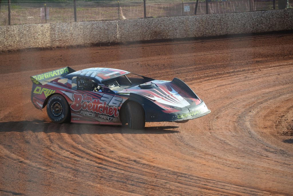 ON THE EDGE: Darren Kane completes the bend on three wheels at Carina Speedway. Photo: Paul Donaldson / NewsMail ON THE EDGE: Darren Kane completes the bend on three wheels at Carina Speedway. Photo: Paul Donaldson / NewsMail