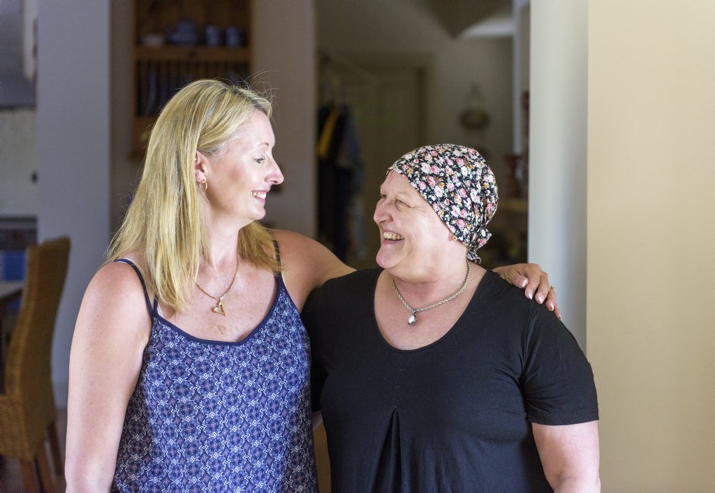Wendy Bell gives her friend Maria Fernance a hug at a visit at her home.Photo Adam Hourigan / The Daily Examiner Wendy Bell gives her friend Maria Fernance a hug at a visit at her home.Photo Adam Hourigan / The Daily Examiner