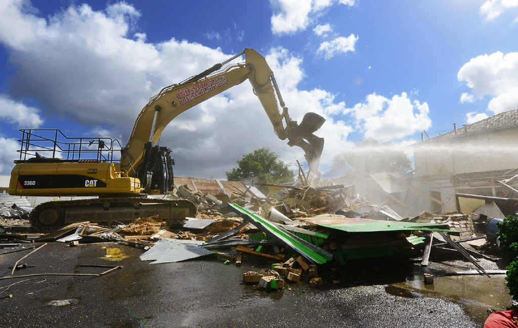 DOWN SHE GOES: Demolition has started on the One Mile Hotel but what exactly will be built on the site remains a mystery. DOWN SHE GOES: Demolition has started on the One Mile Hotel but what exactly will be built on the site remains a mystery.