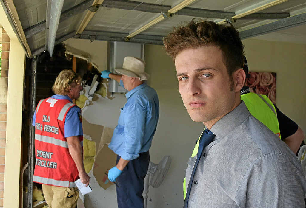 Mountain Creek resident Daniel Osses inspects fire damage to his family’s Glenfields Dr home yesterday. INSET: A burnt out DC isolator in the garage was a model that had been recalled last year for fire concerns. Mountain Creek resident Daniel Osses inspects fire damage to his family’s Glenfields Dr home yesterday. INSET: A burnt out DC isolator in the garage was a model that had been recalled last year for fire concerns.