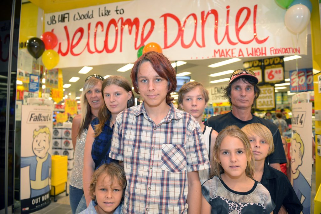 SHOPPING SPREE: Daniel Heise got the surprise of his life when Make-A-Wish Foundation gave him $1000 to spend at JB Hi-Fi. Pictured here with his family. Photo: Max Fleet / NewsMail SHOPPING SPREE: Daniel Heise got the surprise of his life when Make-A-Wish Foundation gave him $1000 to spend at JB Hi-Fi. Pictured here with his family. Photo: Max Fleet / NewsMail