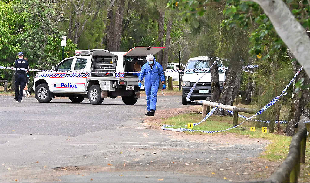 HUNT FOR CLUES: Police mark out the scene of the fatal stabbing at Tewantin yesterday. HUNT FOR CLUES: Police mark out the scene of the fatal stabbing at Tewantin yesterday.