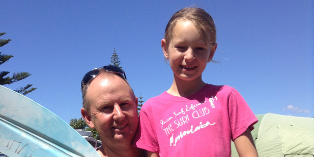 Jim Davenport and his daughter Carly Davenport, 9, after their kayak capsized in Bay of Plenty after which they had a close encounter with either a pilot whale or orca - they are still unsure Jim Davenport and his daughter Carly Davenport, 9, after their kayak capsized in Bay of Plenty after which they had a close encounter with either a pilot whale or orca - they are still unsure