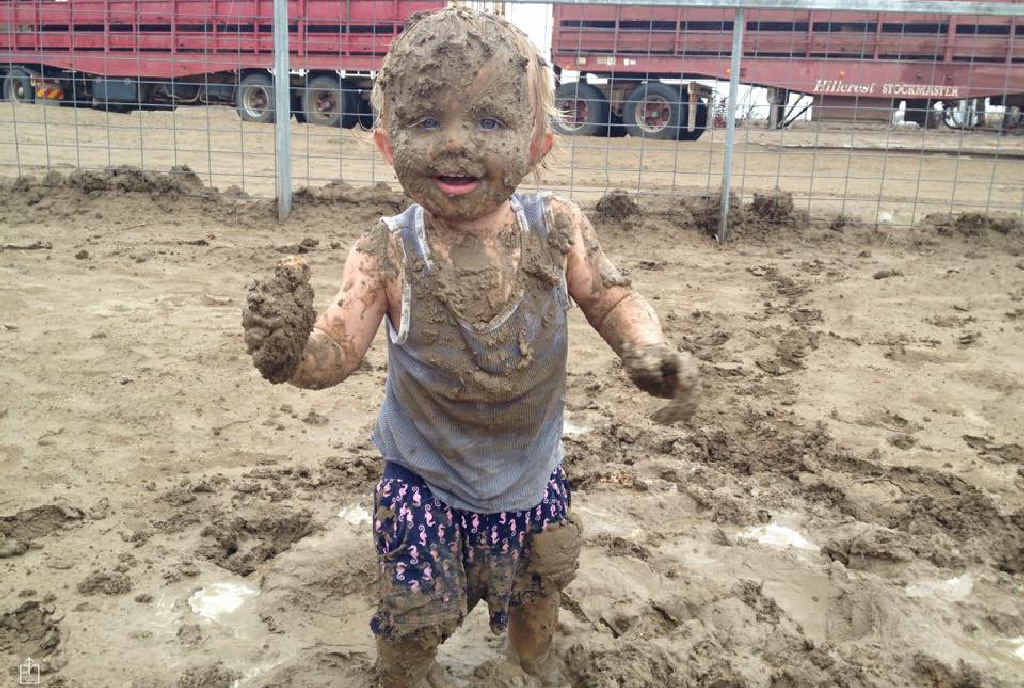 FURTHER WEST: Mud, glorious mud. One-year-old Maggie McAuley experienced rain on her family’s property near Winton for the first time this week, with 73mm turning dusty paddocks into mud baths. FURTHER WEST: Mud, glorious mud. One-year-old Maggie McAuley experienced rain on her family’s property near Winton for the first time this week, with 73mm turning dusty paddocks into mud baths.