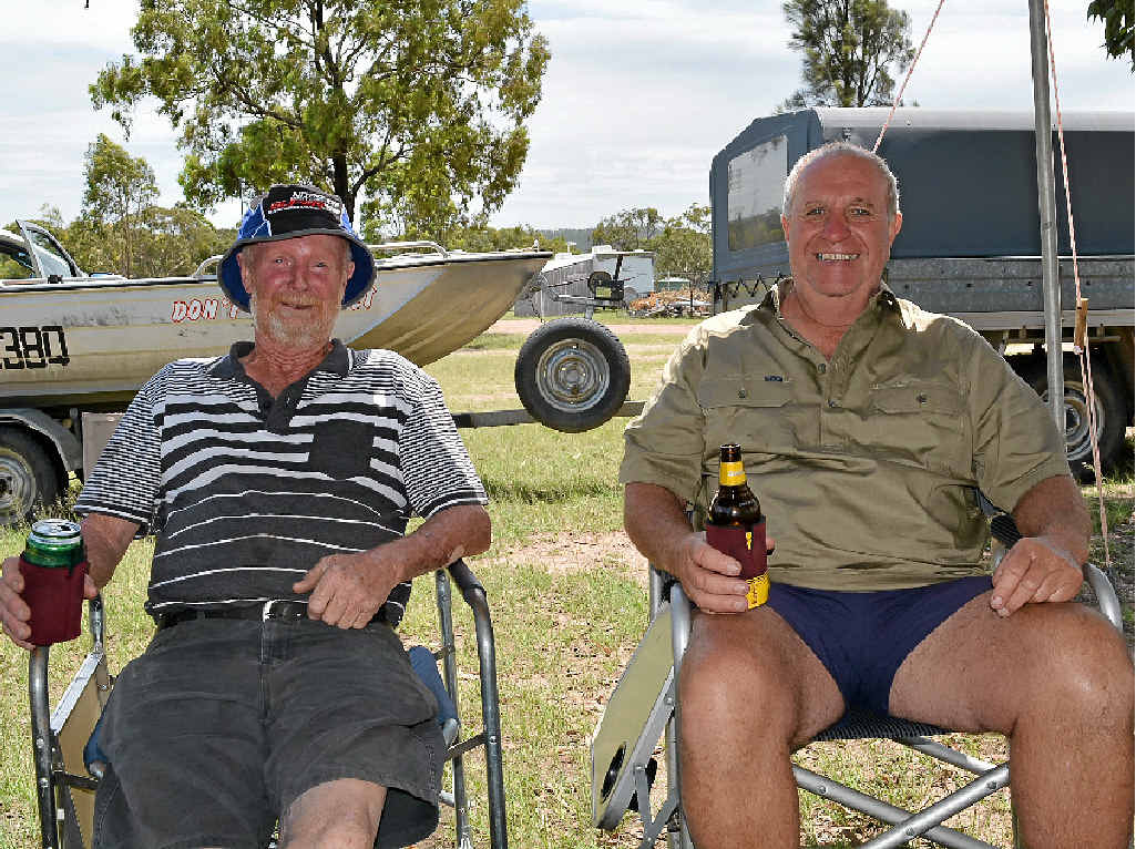 Bluey McMahon and Trevor Sendall enjoy a beer while waiting for the wind to drop at Leslie Dam.
