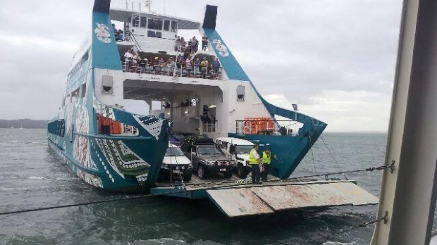 Stradbroke Ferries attempts to get passengers off its stranded Red Cat ferry. Photo: Luke Brown
Stradbroke Ferries attempts to get passengers off its stranded Red Cat ferry. Photo: Luke Brown