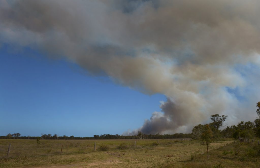 SMOKE CLOUD: A large bushfire in the Burrum Coast National Park. Photo: Mike Knott / NewsMail SMOKE CLOUD: A large bushfire in the Burrum Coast National Park. Photo: Mike Knott / NewsMail