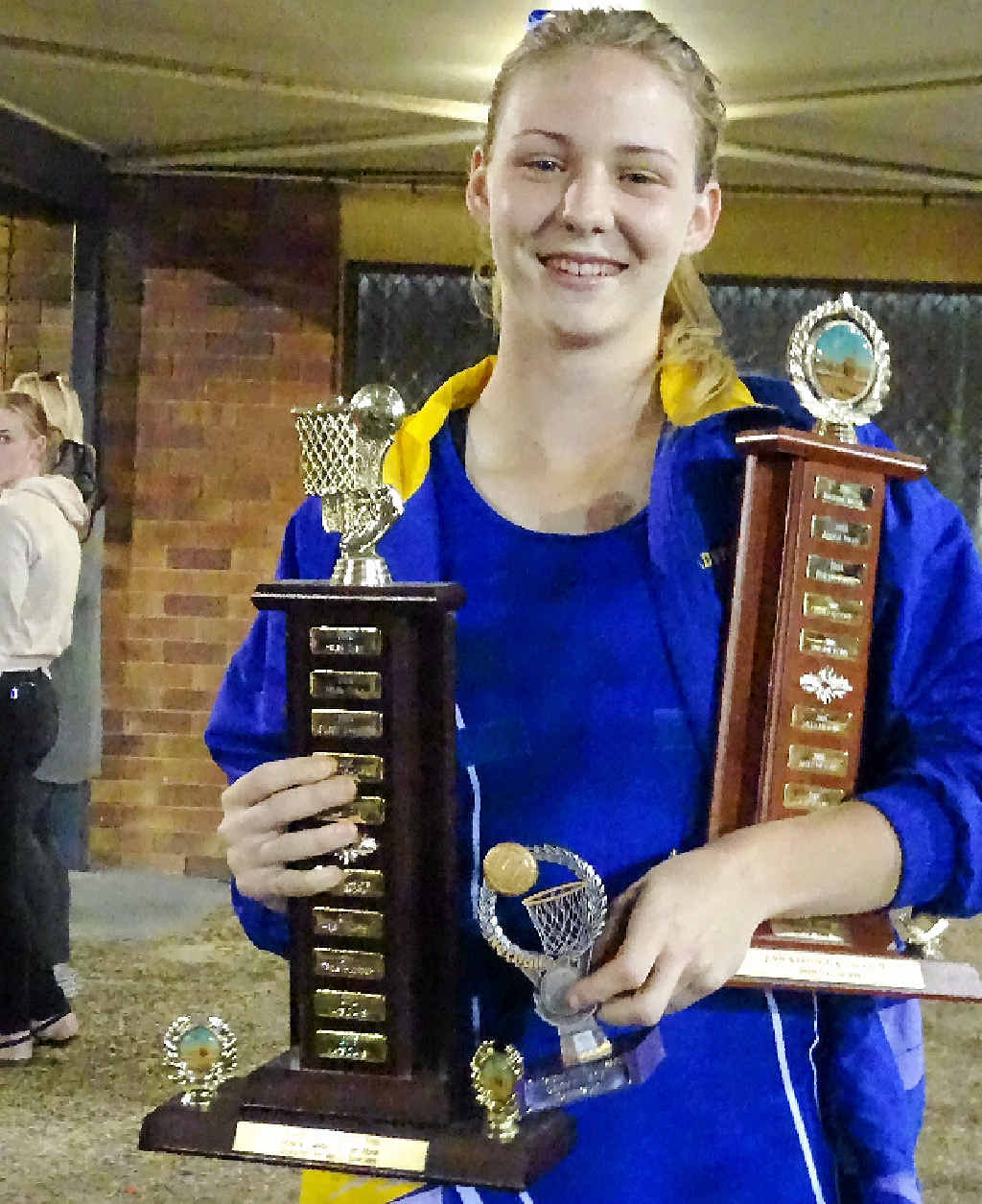BUSY TIMETABLE: Trophy for GNA Senior Player of the Year & GNA Umpire of the Year. Inset: Valleys Stars are Ellie Palmero, Taylor Langdon, Suzette Meiring, Tracey Calis, Trudi McKenzie, Belinda Peachey, Louise Schultz and Yasmin Ramsay. Won the Senior Division 1 grand final 40 - 35. BUSY TIMETABLE: Trophy for GNA Senior Player of the Year & GNA Umpire of the Year. Inset: Valleys Stars are Ellie Palmero, Taylor Langdon, Suzette Meiring, Tracey Calis, Trudi McKenzie, Belinda Peachey, Louise Schultz and Yasmin Ramsay. Won the Senior Division 1 grand final 40 - 35.