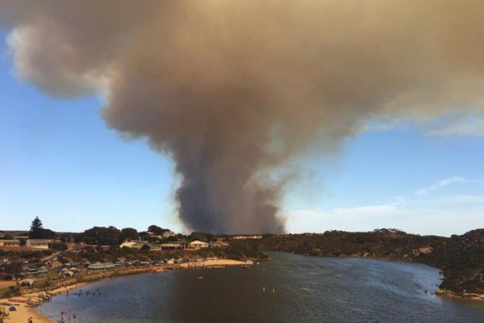 Smoke from a dangerous bushfire threatening lives and homes in Guilderton, Western Australia. Twitter: Geoff Bice Smoke from a dangerous bushfire threatening lives and homes in Guilderton, Western Australia. Twitter: Geoff Bice