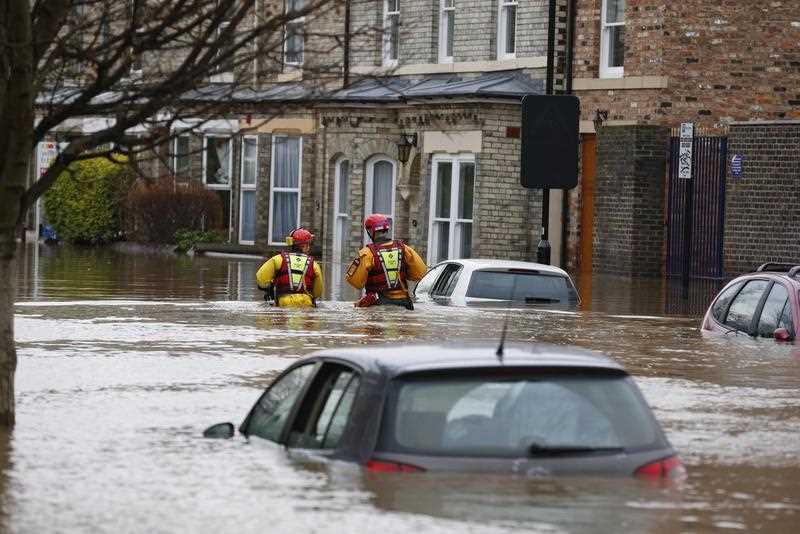 Rescue service workers work to evacuate residents from their flooded homes in York city centre, North Yorkshire, Britain, 28 December 2015. The nearby river Ouse burst its banks after heavy rainfall over Christmas and Boxing Day, causing widespread flooding across the north of Britain with many residents being evacuated by rescue services. Rescue service workers work to evacuate residents from their flooded homes in York city centre, North Yorkshire, Britain, 28 December 2015. The nearby river Ouse burst its banks after heavy rainfall over Christmas and Boxing Day, causing widespread flooding across the north of Britain with many residents being evacuated by rescue services.