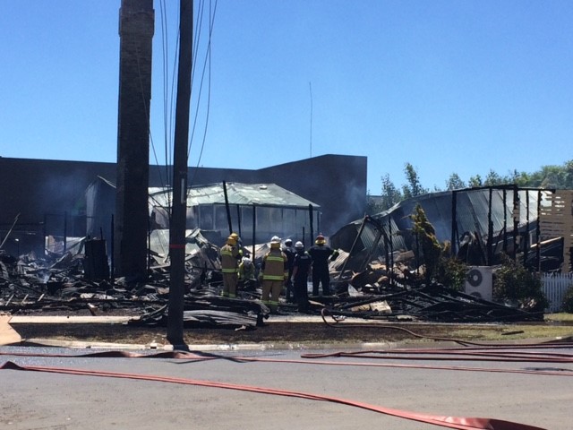 Firefighters search through the rubble of the Tattersalls Club Hotel in Pittsworth, destroyed by fire overnight. Firefighters search through the rubble of the Tattersalls Club Hotel in Pittsworth, destroyed by fire overnight.