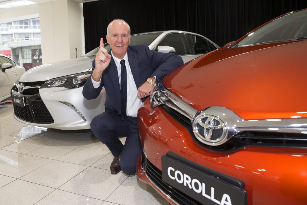 Toyota Executive Director, Sales and Marketing, Tony Cramb with Australia's best selling car, Toyota Corolla. Photo: Contributed Toyota Executive Director, Sales and Marketing, Tony Cramb with Australia's best selling car, Toyota Corolla. Photo: Contributed