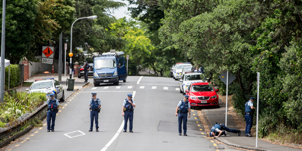 Police teams search for clues after an earlier incident on Shore Road Remuera after the body of a female jogger was found. Photo / Michael Craig Police teams search for clues after an earlier incident on Shore Road Remuera after the body of a female jogger was found. Photo / Michael Craig