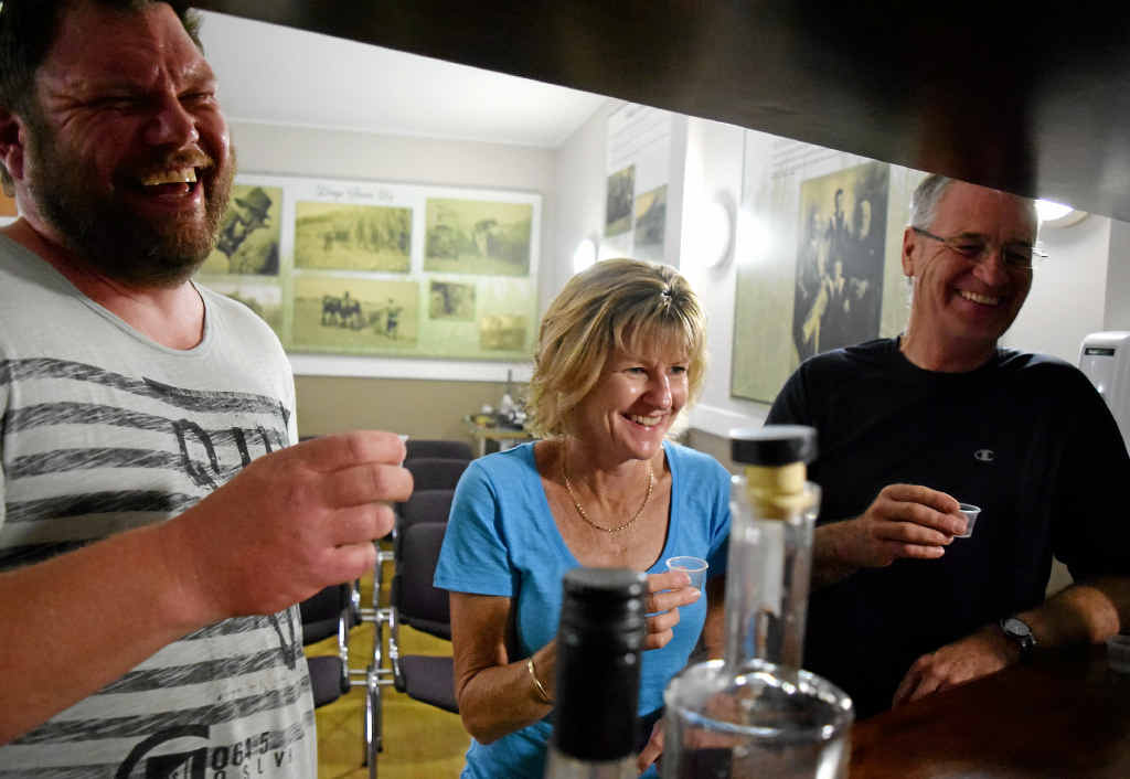 TASTE TESTING: New Zealand families Stu Jones, as well as Janice and Bruce Blackman, enjoy the taste of rum made from our very own sugarcane grown throughout the region. TASTE TESTING: New Zealand families Stu Jones, as well as Janice and Bruce Blackman, enjoy the taste of rum made from our very own sugarcane grown throughout the region.