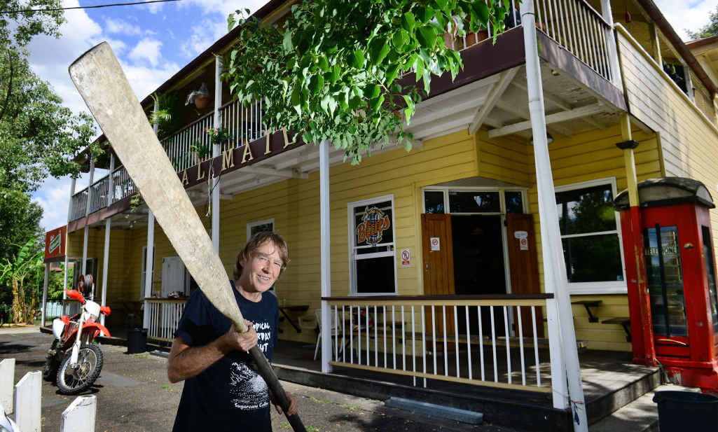 AWESOME: Royal Mail Hotel owner Andrew Cafe with the oar he used to defend his Goodna pub from floating debris during the 2011 floods. AWESOME: Royal Mail Hotel owner Andrew Cafe with the oar he used to defend his Goodna pub from floating debris during the 2011 floods.
