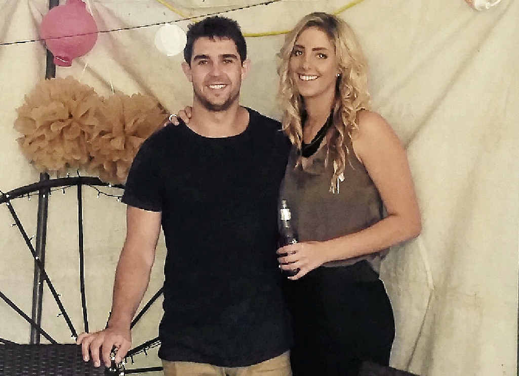 Dylan Galloway (left) is thankful for the quick thinking of his girlfriend Katie Johnson (right) and staff at Warwick Hospital for ensuring he survived a potentially fatal meningococcal infection. Photo Contributed Dylan Galloway (left) is thankful for the quick thinking of his girlfriend Katie Johnson (right) and staff at Warwick Hospital for ensuring he survived a potentially fatal meningococcal infection. Photo Contributed