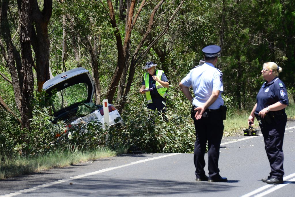 Police investigate a fatal car accident on the Gatton-Esk Road at Mt Hallen. Photo: David Nielsen / The Queensland Times Police investigate a fatal car accident on the Gatton-Esk Road at Mt Hallen. Photo: David Nielsen / The Queensland Times