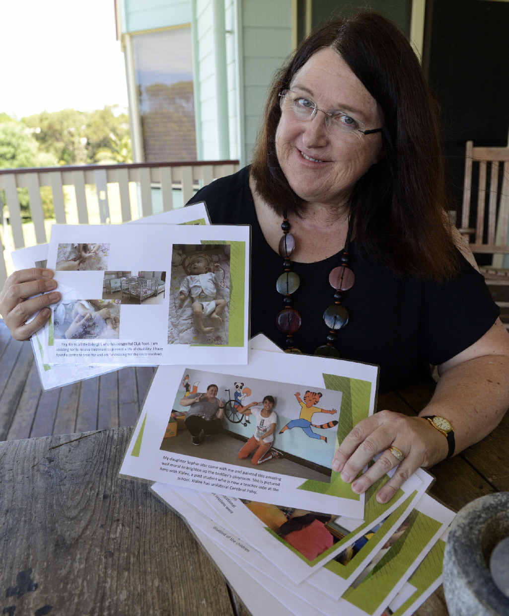 GOOD WORK: Physiotherapist Andrea McLaren is raising money for a Chinese orphan named Xin Yi who needs treatment. GOOD WORK: Physiotherapist Andrea McLaren is raising money for a Chinese orphan named Xin Yi who needs treatment.