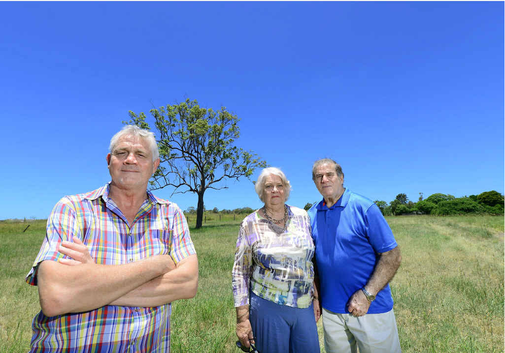 TAKING A STAND: Gervase Pender and Bernadette and Warren Stone’s homes will be sandwiched between small lot estates under a new proposal. TAKING A STAND: Gervase Pender and Bernadette and Warren Stone’s homes will be sandwiched between small lot estates under a new proposal.