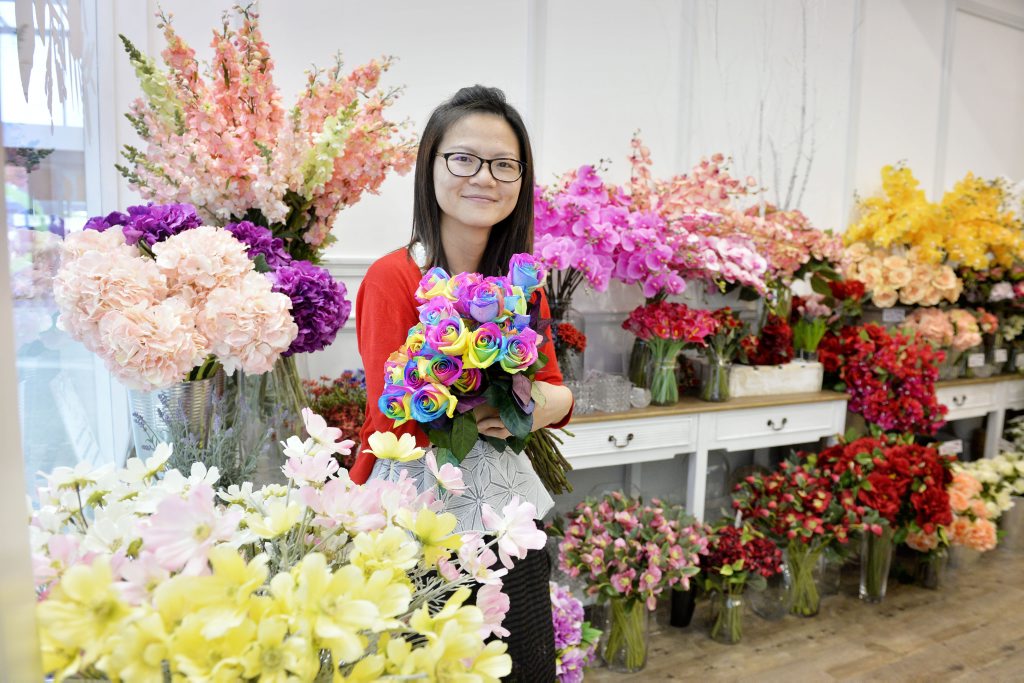 SMELL OF SUCCESS: Owner of Sweet Moments Florist, Alice Sui, at Orion Springfield. She moved from Hong Kong to Australia so she could achieve her dream. SMELL OF SUCCESS: Owner of Sweet Moments Florist, Alice Sui, at Orion Springfield. She moved from Hong Kong to Australia so she could achieve her dream.
