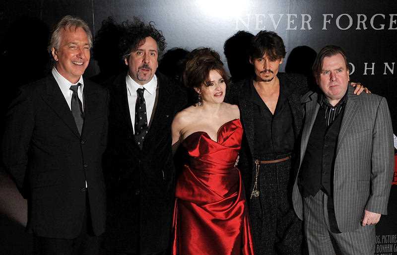 Actor Alan Rickman, Director Tim Burton, Actress Helena Bonham Carter, Actor Johnny Depp and Actor Timothy Spall pose for photographers at the premiere of Sweeney Todd: The Demon Barber of Fleet Street, in London. Actor Alan Rickman, Director Tim Burton, Actress Helena Bonham Carter, Actor Johnny Depp and Actor Timothy Spall pose for photographers at the premiere of Sweeney Todd: The Demon Barber of Fleet Street, in London.