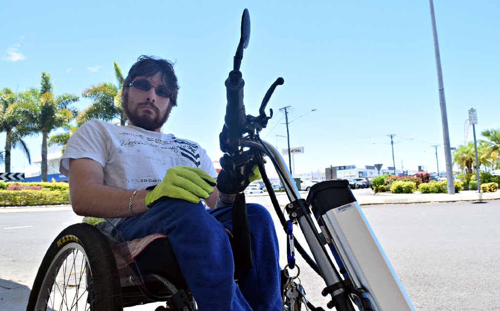 FRUSTRATED: Michael Anderson fell out of his wheelchair while crossing a busy street and says drivers did not stop to help him. FRUSTRATED: Michael Anderson fell out of his wheelchair while crossing a busy street and says drivers did not stop to help him.
