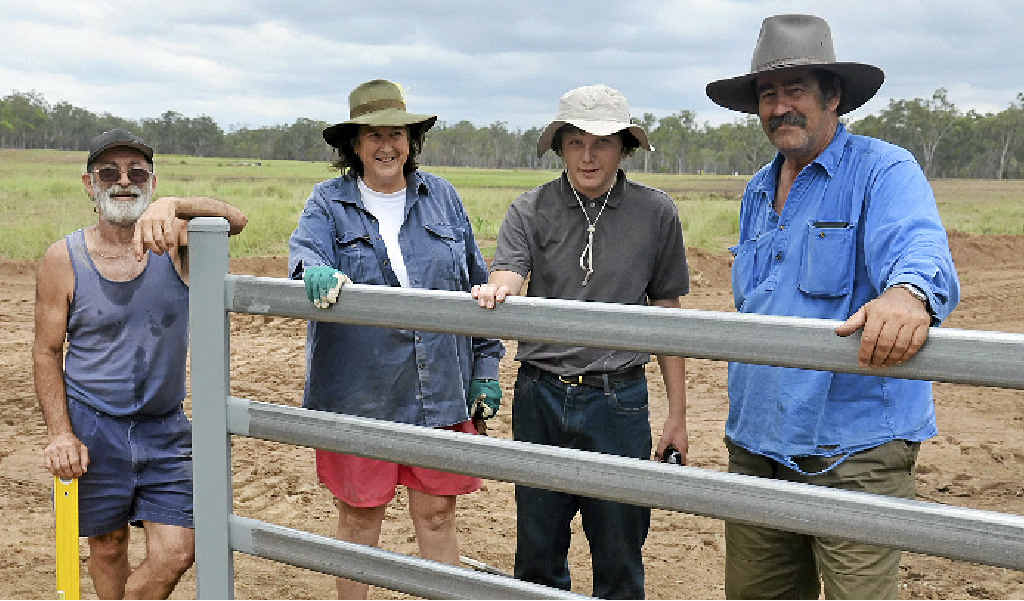 Right: Nick Speranza, Merry Barclay, Reilly Thomson and Greg Barclay work on the Warwick Aero Modellers complex at Morgan Park.