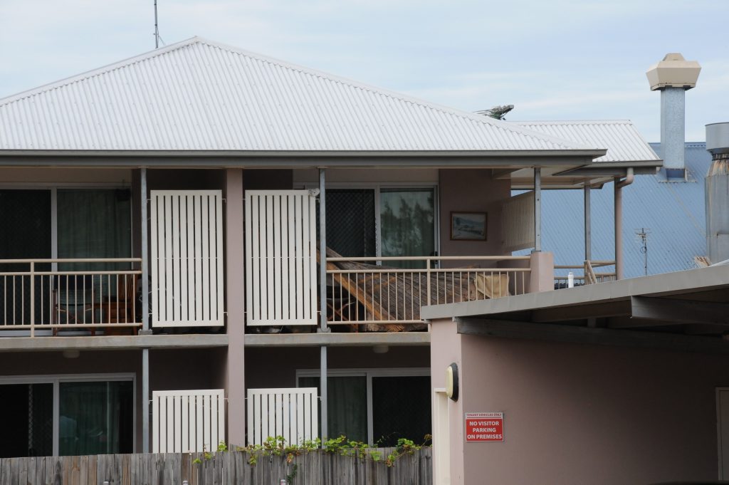 The unit (right) in which a man is barricaded. The unit (right) in which a man is barricaded.