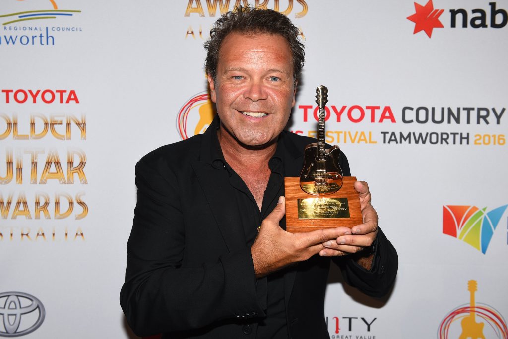 Troy Cassar-Daley poses for a photograph after winning the Golden Guitar for Single of the Year, at the 44th annual Golden Guitar Awards in Tamworth. Troy Cassar-Daley poses for a photograph after winning the Golden Guitar for Single of the Year, at the 44th annual Golden Guitar Awards in Tamworth.