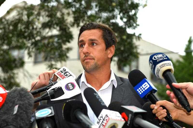 Sydney Roosters NRL player Mitchell Pearce makes a brief statement to the media in Sydney, Friday, Jan. 29, 2016. Pearce has apologised for his actions at an Australia Day party which he appeared in a video performing lewd acts. Sydney Roosters NRL player Mitchell Pearce makes a brief statement to the media in Sydney, Friday, Jan. 29, 2016. Pearce has apologised for his actions at an Australia Day party which he appeared in a video performing lewd acts.