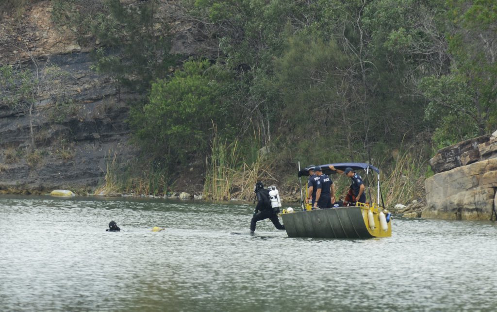 Police divers search for the body of Duncan Wilmott in Aqua Lake. Photo: Rob Williams / The Queensland Times Police divers search for the body of Duncan Wilmott in Aqua Lake. Photo: Rob Williams / The Queensland Times