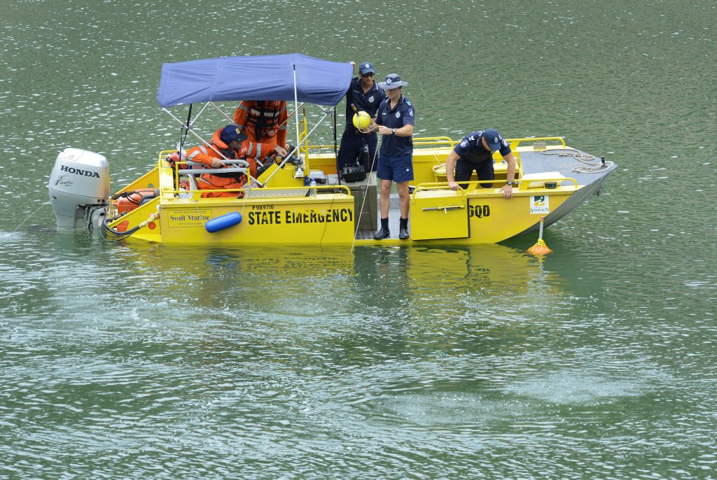 Police divers search for the body of Duncan Wilmott in Aqua Lake. Photo: Rob Williams / The Queensland Times Police divers search for the body of Duncan Wilmott in Aqua Lake. Photo: Rob Williams / The Queensland Times
