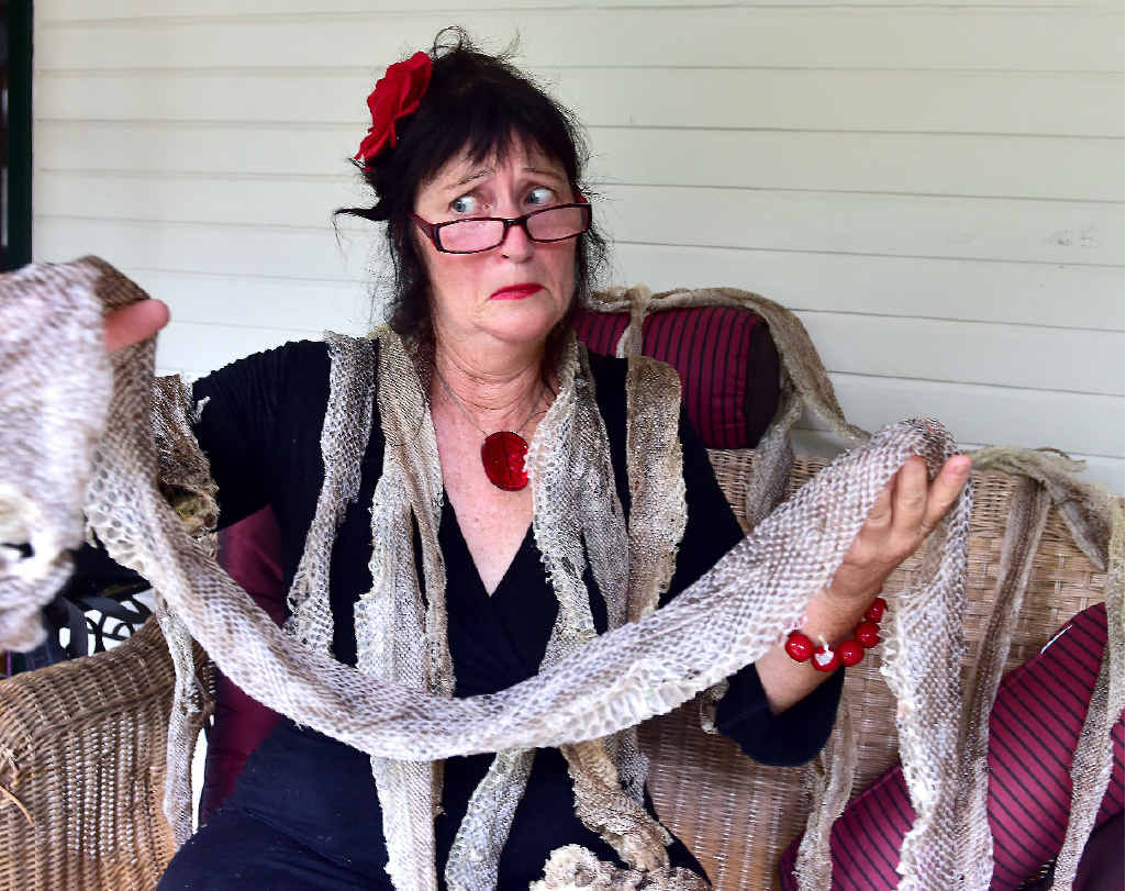 WEIGHING UP THE SCALES: Jacq Rutland bravely deals with her snake phobia after workers replacing the roof of her Verrierdale home found 20 snake skins, the longest being 2.5m. WEIGHING UP THE SCALES: Jacq Rutland bravely deals with her snake phobia after workers replacing the roof of her Verrierdale home found 20 snake skins, the longest being 2.5m.