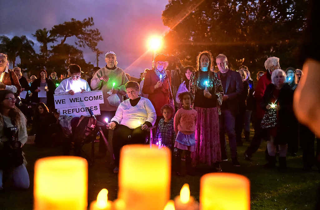 COMPASSION: A candelight vigil was held for refugees in the Cotton Tree park. COMPASSION: A candelight vigil was held for refugees in the Cotton Tree park.