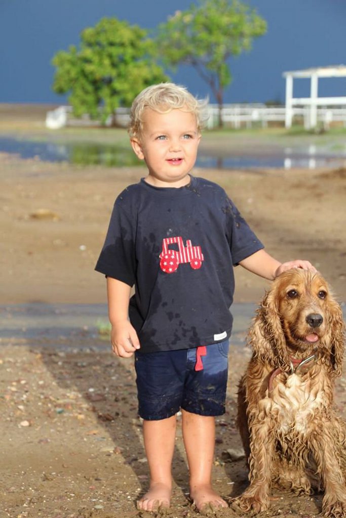 James Walker from Camden Park Between Ilfracombe and Longreach experienced his first thunderstorm this week. He played with pet dog Maggie in the mud after. James Walker from Camden Park Between Ilfracombe and Longreach experienced his first thunderstorm this week. He played with pet dog Maggie in the mud after.