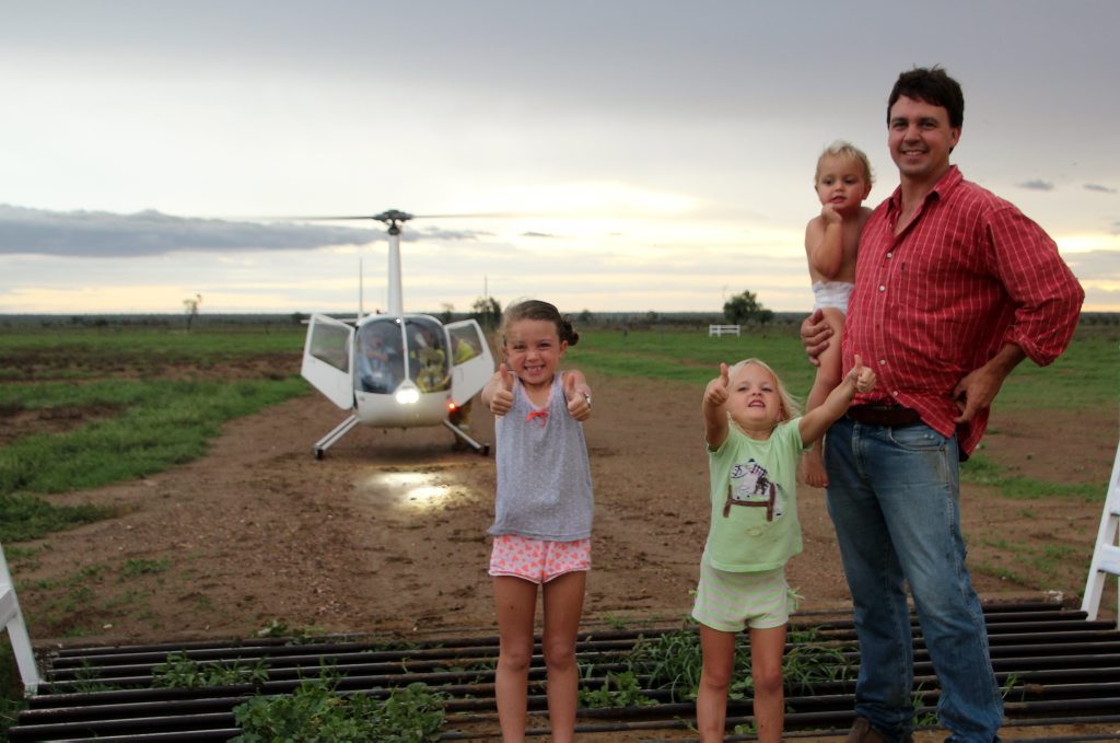 Sophia (7), Chloe (5), James (2) and dad James Walker are enjoying greener pastures after rain at their Camden Park property. Sophia (7), Chloe (5), James (2) and dad James Walker are enjoying greener pastures after rain at their Camden Park property.
