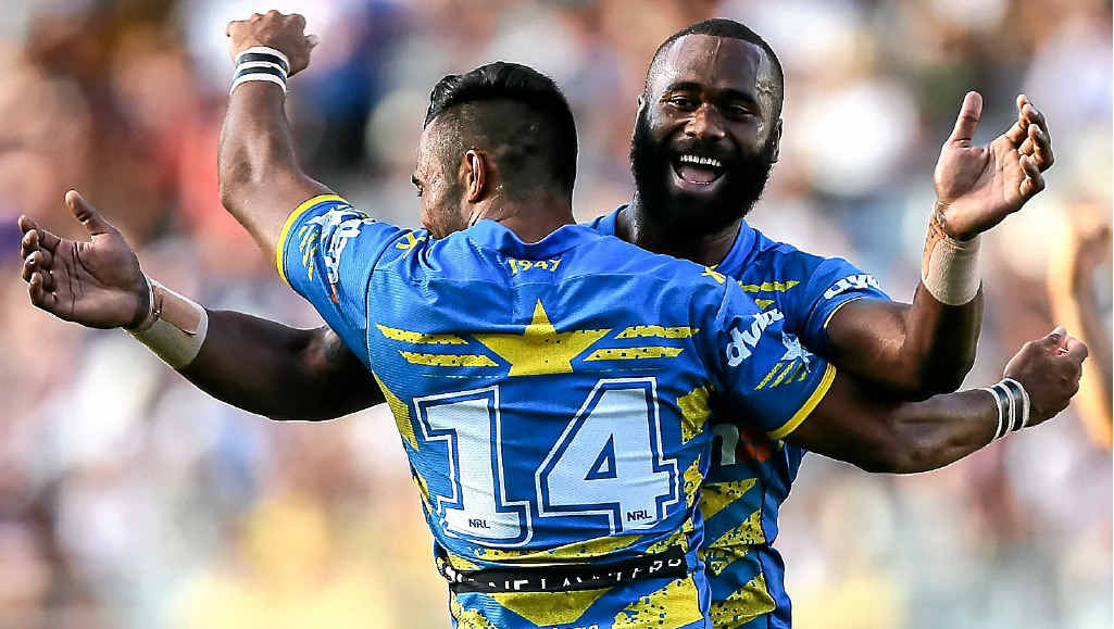 ELATION: Semi Radradra, of the Eels, celebrates one of his tries in the final, while (below) Warriors star Shaun Johnson struggles to his feet. ELATION: Semi Radradra, of the Eels, celebrates one of his tries in the final, while (below) Warriors star Shaun Johnson struggles to his feet.