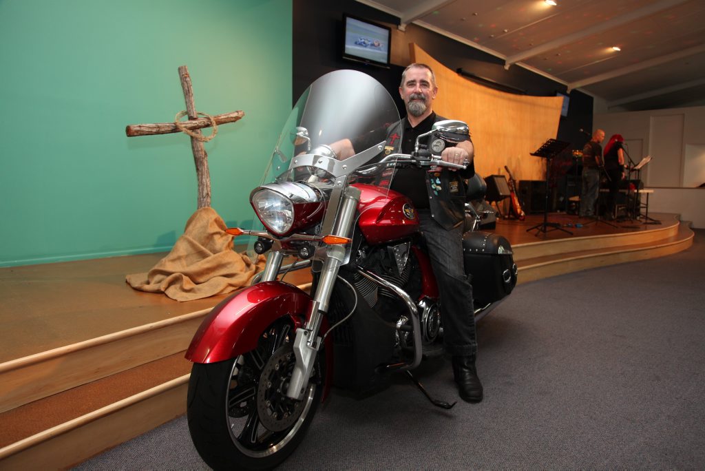Image for sale: Pastor Dave Woodward gears up for the Biker Blessing at the Door of Hope church in Maryborough on Sunday. Photo: Jocelyn Watts / Fraser Coast Chronicle