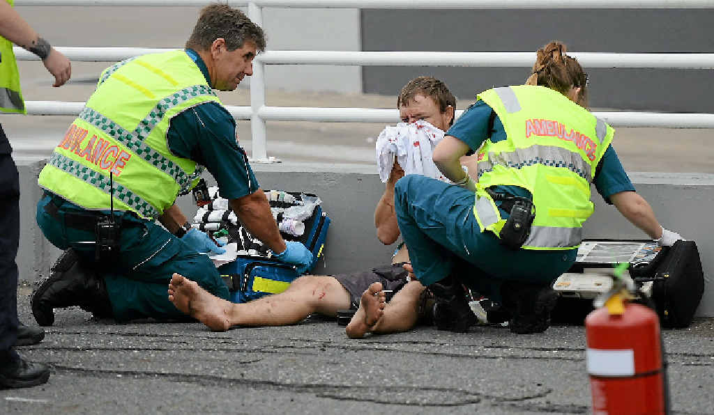 CAR CRASH: Paramedics on scene at the crash of a car that was hijacked on Sunday at City Centre Plaza. CAR CRASH: Paramedics on scene at the crash of a car that was hijacked on Sunday at City Centre Plaza.