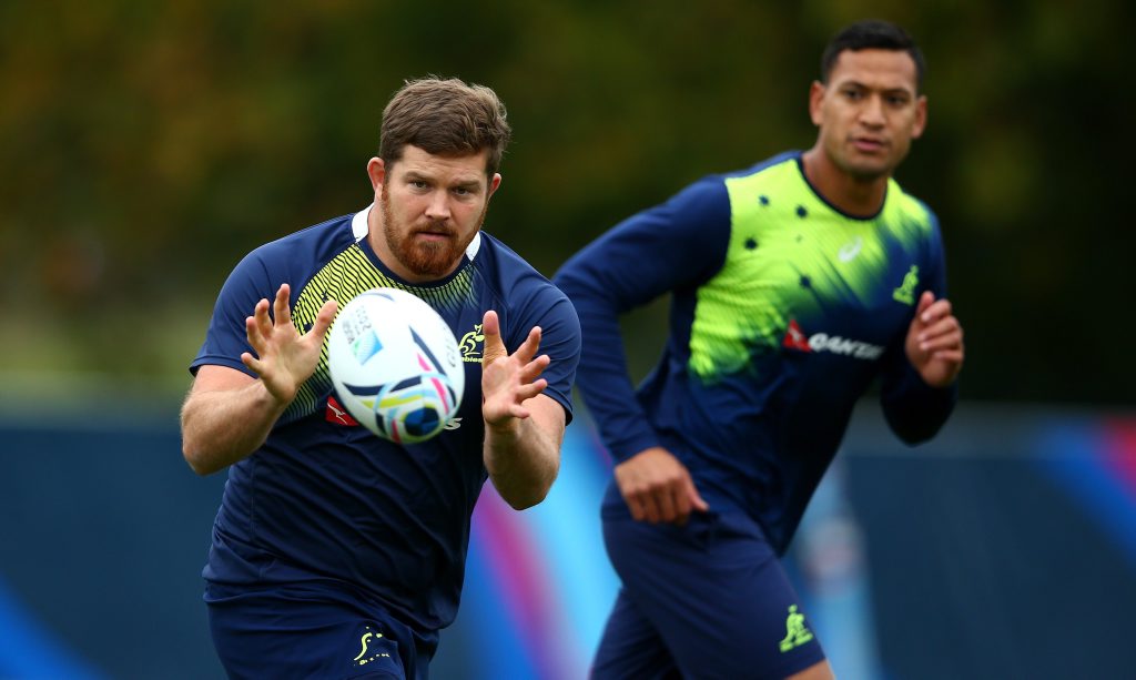 Greg Holmes of Australia receives a pass during a training session at the Lensbury Hotel on October 21, 2015 in London, United Kingdom. Photo by Dan Mullan/Getty Images Greg Holmes of Australia receives a pass during a training session at the Lensbury Hotel on October 21, 2015 in London, United Kingdom. Photo by Dan Mullan/Getty Images